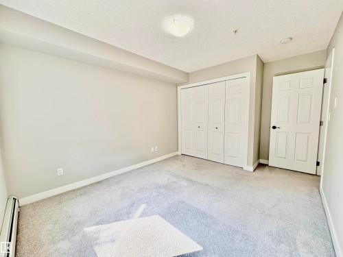 #111 11511 27 Av Nw, Edmonton, AB - Indoor Photo Showing Other Room