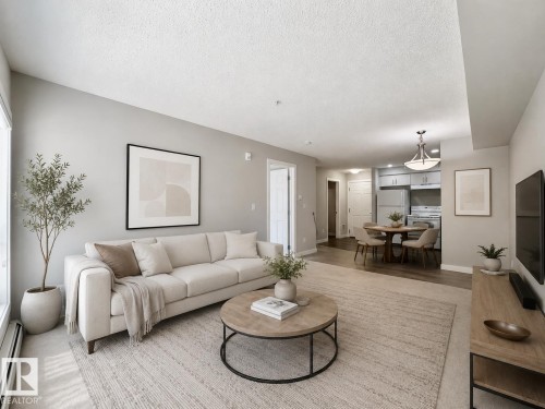 #111 11511 27 Av Nw, Edmonton, AB - Indoor Photo Showing Living Room
