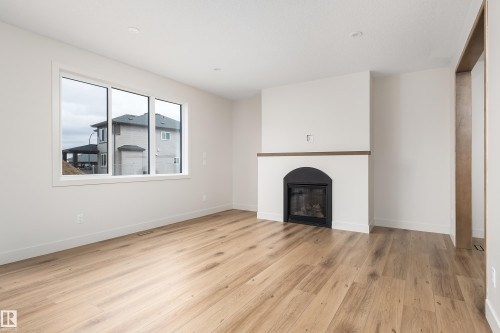 8 Darby Crescent, Spruce Grove, AB - Indoor Photo Showing Living Room With Fireplace