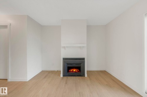 5833 Riverbend Road Nw, Edmonton, AB - Indoor With Fireplace