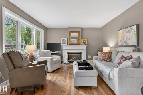 10108 144 Street Nw, Edmonton, AB - Indoor Photo Showing Living Room With Fireplace