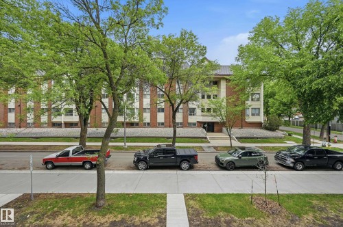 Brick facade multi-story building featuring a prominent main entrance with steps - #203 11103 84 Av Nw, Edmonton, AB - Outdoor