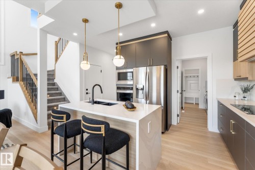 12 Cobblestone Gate, Spruce Grove, AB - Indoor Photo Showing Kitchen With Double Sink With Upgraded Kitchen