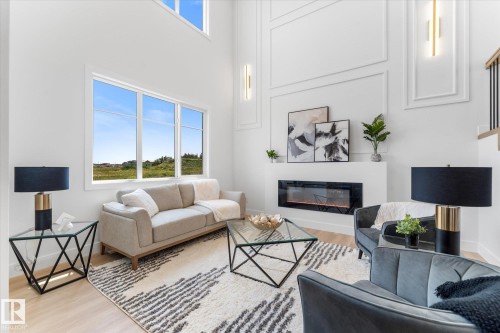 12 Cobblestone Gate, Spruce Grove, AB - Indoor Photo Showing Living Room With Fireplace