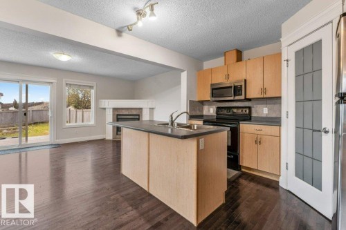 3545 11 Street Nw, Edmonton, AB - Indoor Photo Showing Kitchen With Double Sink