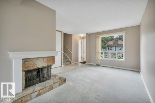 #22 1651 46 St Nw, Edmonton, AB - Indoor With Fireplace
