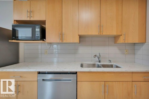 #22 1651 46 St Nw, Edmonton, AB - Indoor Photo Showing Kitchen With Double Sink