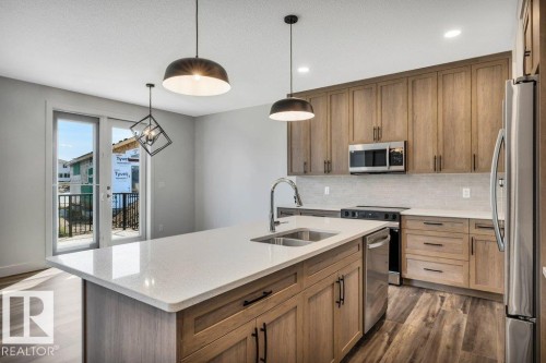 13 Hillwood Terrace, Spruce Grove, AB - Indoor Photo Showing Kitchen With Stainless Steel Kitchen With Double Sink With Upgraded Kitchen