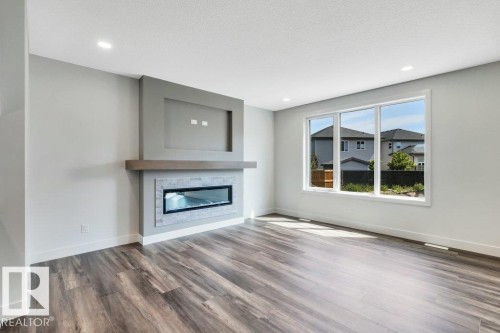 13 Hillwood Terrace, Spruce Grove, AB - Indoor Photo Showing Living Room With Fireplace