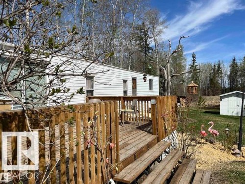 Expansive wooden deck providing outdoor living space - 210 55504 Nikoodi Road, Rural Lac Ste. Anne County, AB - Outdoor