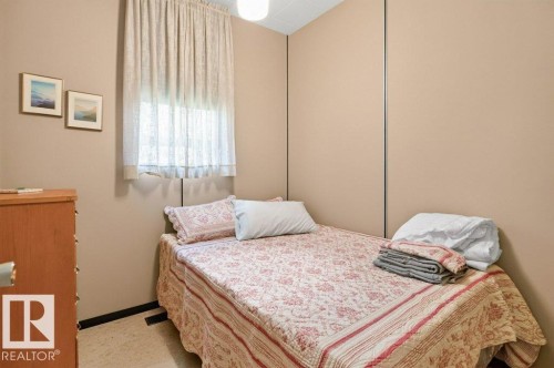 #506 54411 Rge Road 40, Rural Lac Ste. Anne County, AB - Indoor Photo Showing Bedroom
