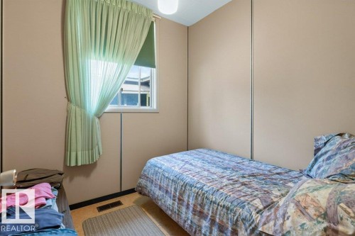 #506 54411 Rge Road 40, Rural Lac Ste. Anne County, AB - Indoor Photo Showing Bedroom