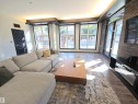#106 10531 117 St Nw, Edmonton, AB  - Indoor Photo Showing Living Room With Fireplace 