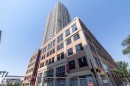 Modern high-rise residential building with a multi-story commercial base - #2402 10410 102 Av Nw, Edmonton, AB  - Outdoor With Facade 