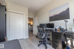 Versatile room featuring light wood-finish flooring and neutral wall tones - 