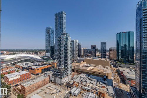 Expansive urban skyline featuring contemporary high-rise buildings and architectural landmarks - #2402 10410 102 Av Nw, Edmonton, AB - Outdoor With View
