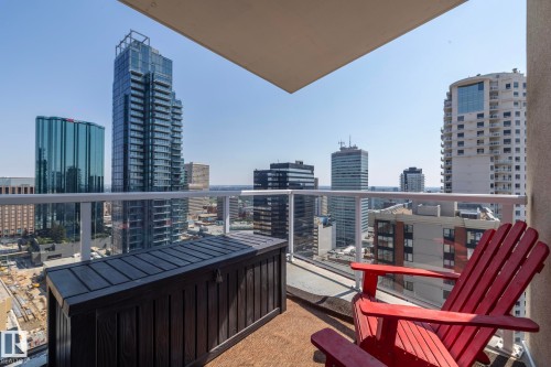 Expansive balcony featuring a glass and metal railing system, offering panoramic city skyline views - #2402 10410 102 Av Nw, Edmonton, AB - Outdoor With Balcony With Exterior