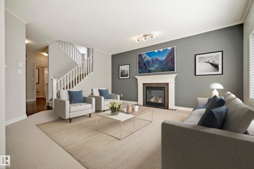 8385 Shaske Crescent Nw, Edmonton, AB - Indoor Photo Showing Living Room With Fireplace