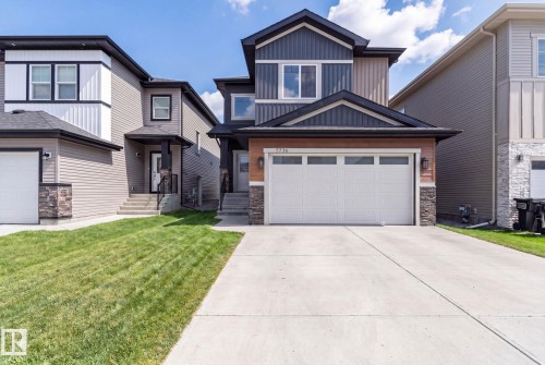5736 176 Avenue Nw, Edmonton, AB - Outdoor With Facade