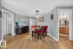 Hardwood-style flooring extends throughout this interior space - 