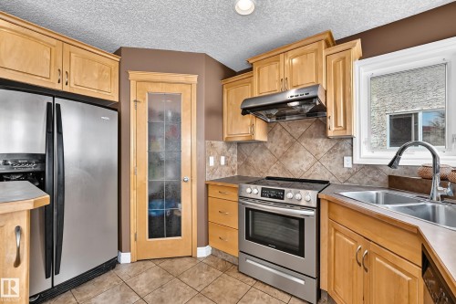 16619 72 Street Nw, Edmonton, AB - Indoor Photo Showing Kitchen With Double Sink