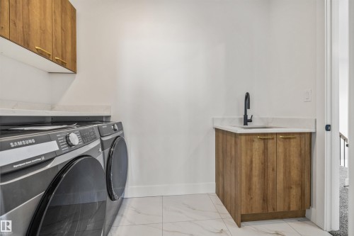 21 Sorel Avenue, Beaumont, AB - Indoor Photo Showing Laundry Room