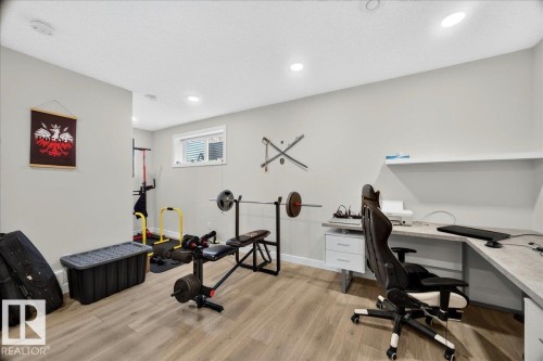 100 Meadowland Crescent, Spruce Grove, AB - Indoor Photo Showing Gym Room
