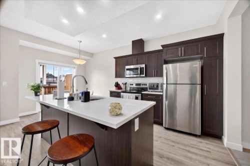 100 Meadowland Crescent, Spruce Grove, AB - Indoor Photo Showing Kitchen With Upgraded Kitchen