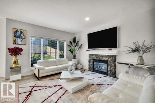 76 Everitt Drive, St. Albert, AB - Indoor Photo Showing Living Room With Fireplace