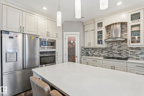 3808 Triomphe Boulevard, Beaumont, AB - Indoor Photo Showing Kitchen With Stainless Steel Kitchen With Upgraded Kitchen