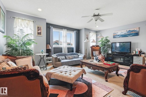 3808 Triomphe Boulevard, Beaumont, AB - Indoor Photo Showing Living Room