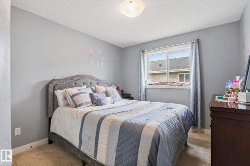 3808 Triomphe Boulevard, Beaumont, AB - Indoor Photo Showing Bedroom