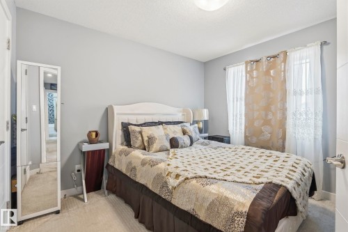 3808 Triomphe Boulevard, Beaumont, AB - Indoor Photo Showing Bedroom