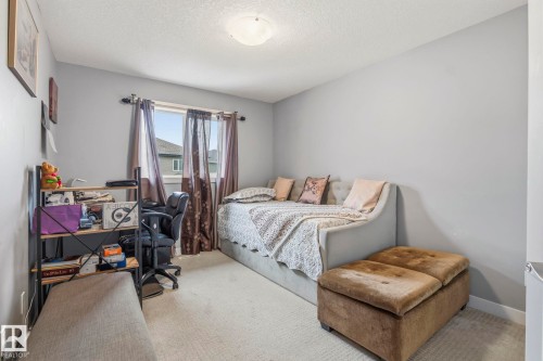 3808 Triomphe Boulevard, Beaumont, AB - Indoor Photo Showing Bedroom