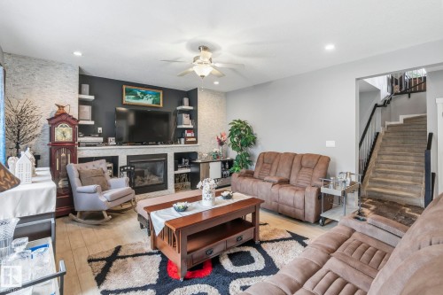 3808 Triomphe Boulevard, Beaumont, AB - Indoor Photo Showing Living Room With Fireplace