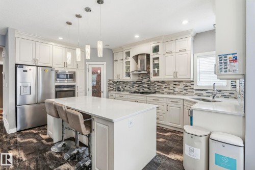 3808 Triomphe Boulevard, Beaumont, AB - Indoor Photo Showing Kitchen With Stainless Steel Kitchen With Double Sink With Upgraded Kitchen