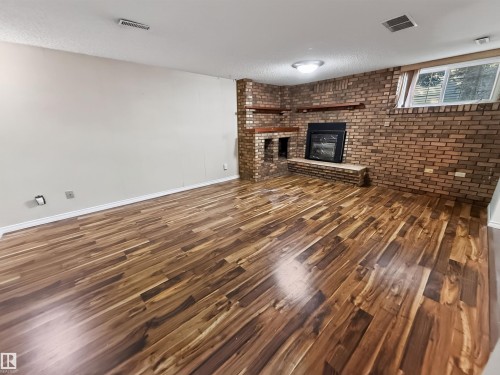 11327 25 Avenue Nw, Edmonton, AB - Indoor With Fireplace