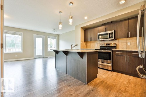 260 Sturtz Bend, Leduc, AB - Indoor Photo Showing Kitchen With Upgraded Kitchen