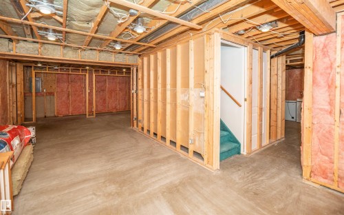 Unfinished basement with exposed wooden framing and concrete flooring - 5116 51 Avenue, Pickardville, AB - Indoor Photo Showing Basement