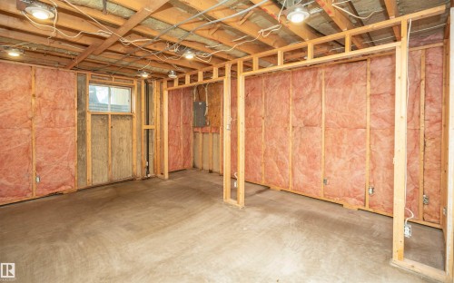 Unfinished interior space with exposed wood framing and insulation - 5116 51 Avenue, Pickardville, AB - Indoor Photo Showing Basement