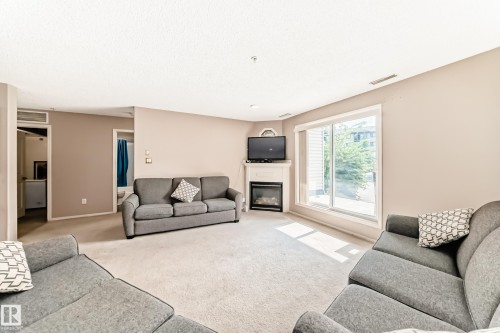 16311 95 Street Nw, Edmonton, AB - Indoor Photo Showing Living Room With Fireplace