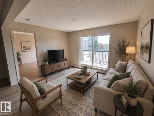 #223 1180 Hyndman Rd Nw, Edmonton, AB - Indoor Photo Showing Living Room