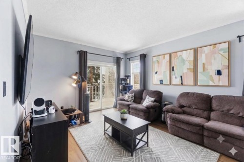 #11 1179 Summerside Dr Sw, Edmonton, AB - Indoor Photo Showing Living Room