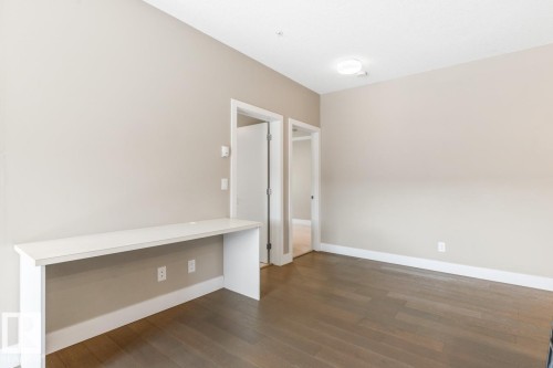 Open Space With Built-In Counter For Computer Or For Your Collection Of Wine.. - #203 10006 83 Av Nw, Edmonton, AB - Indoor Photo Showing Other Room