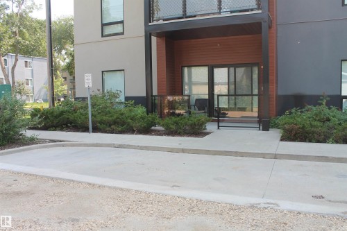 Visitor Parking All Along The Side Of The Building By The Paved Lane. - #203 10006 83 Av Nw, Edmonton, AB - Outdoor