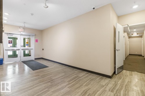Front Entrance Into The Building With Security Doors. - #203 10006 83 Av Nw, Edmonton, AB - Indoor Photo Showing Other Room