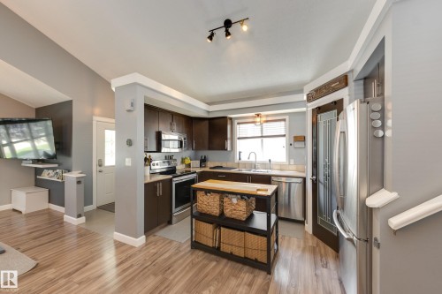 7904 13 Avenue Sw, Edmonton, AB - Indoor Photo Showing Kitchen With Double Sink