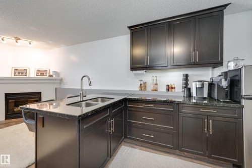 7904 13 Avenue Sw, Edmonton, AB - Indoor Photo Showing Kitchen With Double Sink