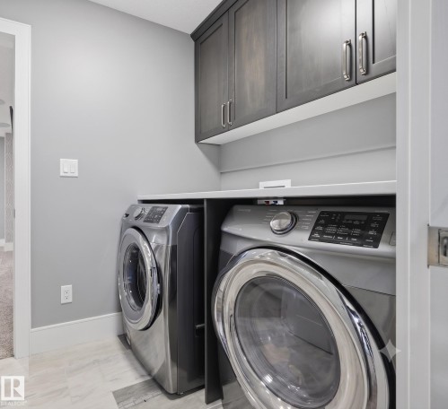 1305 Hainstock Way Sw, Edmonton, AB - Indoor Photo Showing Laundry Room
