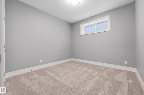 1305 Hainstock Way Sw, Edmonton, AB - Indoor Photo Showing Other Room